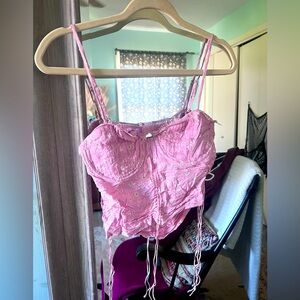 Cute pink crop top from Isabelle’s cabinet